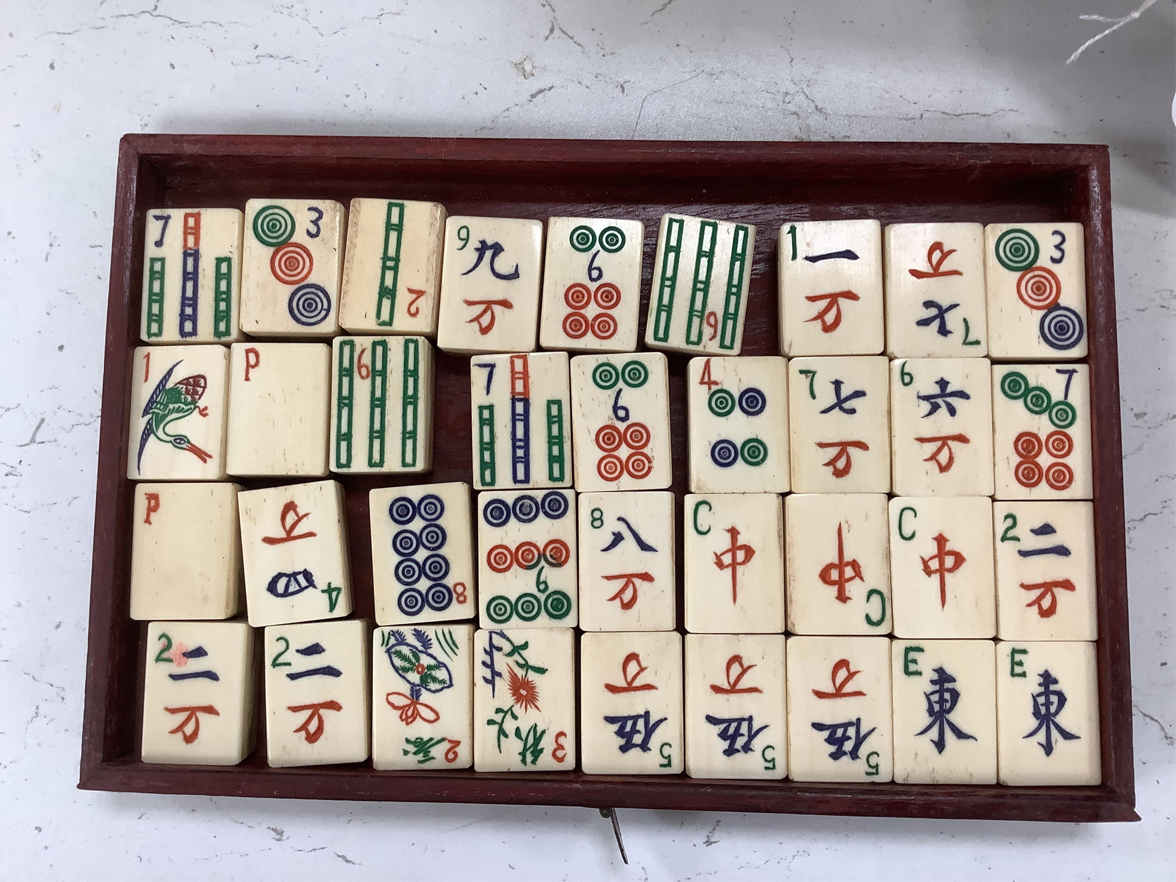 An early 20th century Chinese cased mah jong set, 20cm wide x 17cm high